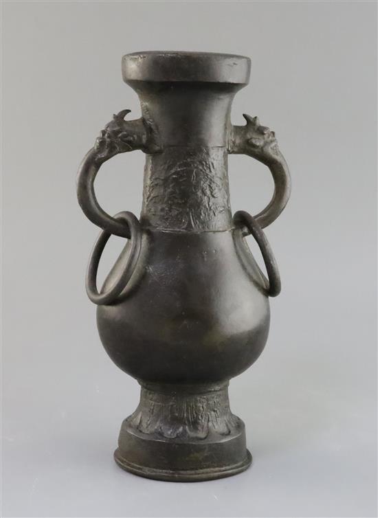 A Chinese bronze temple vase, Song-Yuan dynasty (12th-14th century), H. 29.5cm